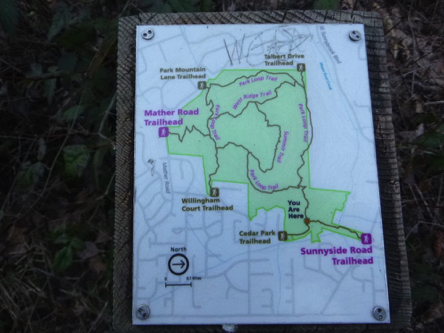 Park map on the top of directional signage